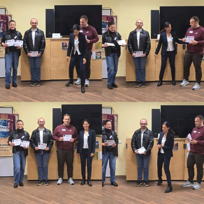 Collage of several moments from a Toastmasters meeting in a seminar room. Adults stand in front of a large screen, holding certificates, speaking with each other and posing for award photos.