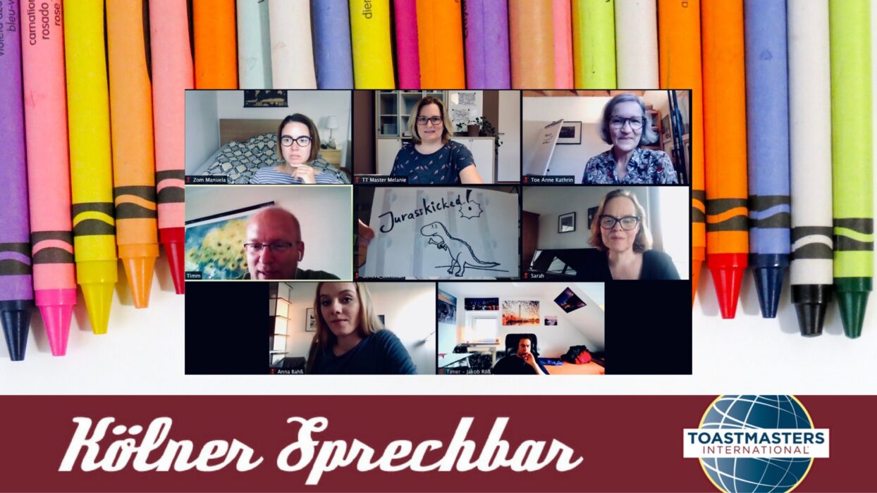 Dieselbe Zoom-Konferenz vor bunten Buntstiften, darunter der Schriftzug „Kölner Sprechbar“ und das Toastmasters-International-Logo.