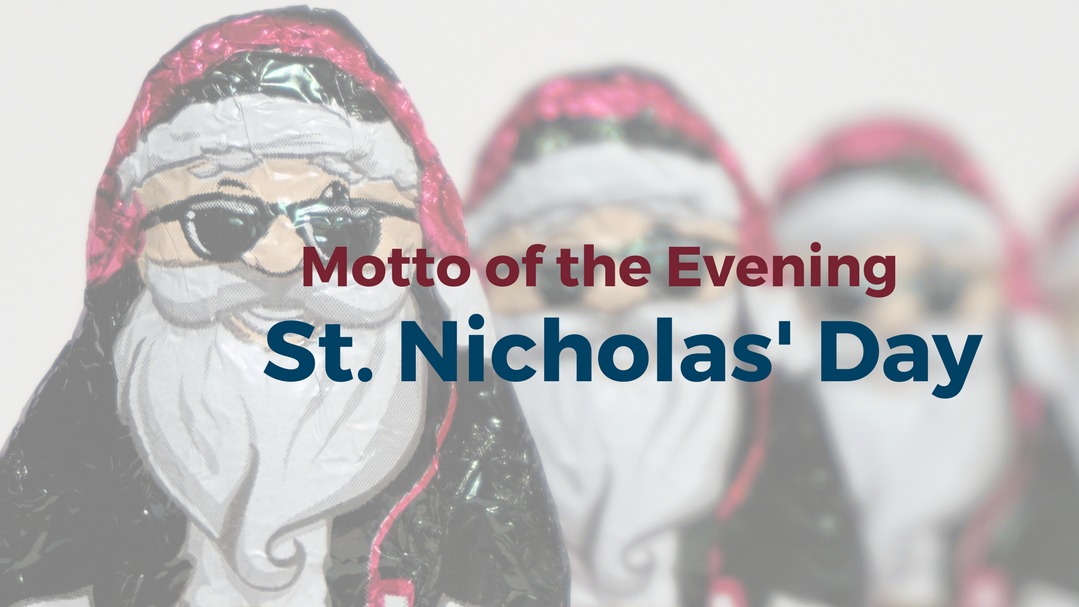 Grafik mit dem Motto des Abends „St. Nicholas’ Day“ vor mehreren Schokoladen-Nikoläusen.